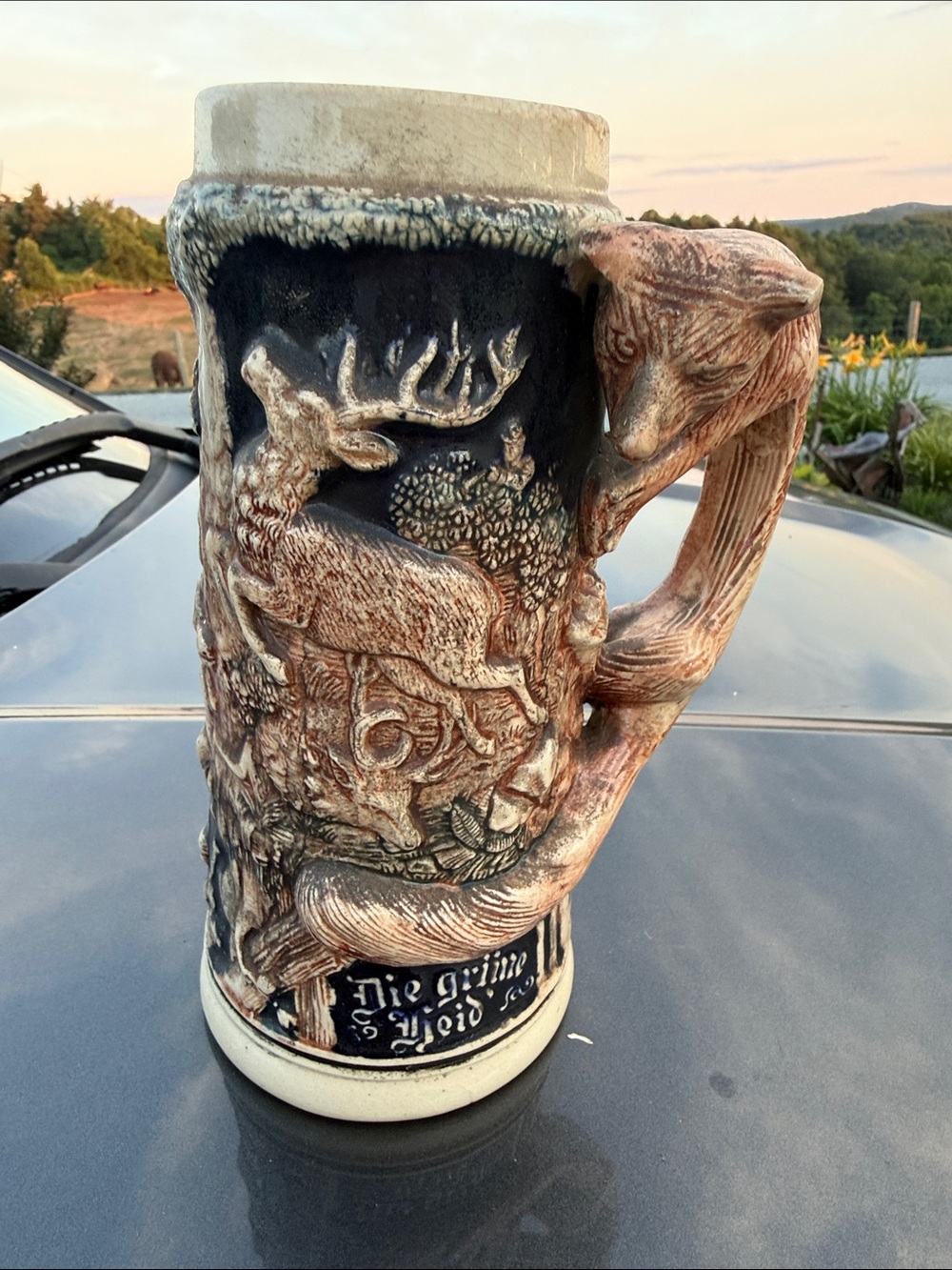 German-Style Stoneware Deer Relief Beer Stein in Brown and Black
